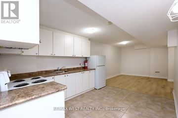Mississauga (Churchill Meadows) apartment for rent - A kitchen with white cabinets and a countertop.