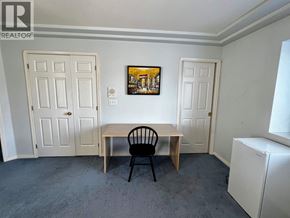 Burnaby apartment for rent - A room with a table and chair in it.