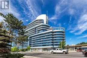 Toronto (Bayview Village) condo for rent - A modern building with a curved design and a white dome on top.