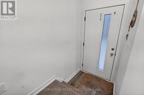 Welland (N. Welland) townhouse for rent - A white door with a glass window is in a room with white walls.