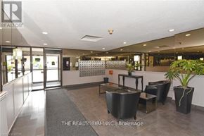 London South (South D) condo for rent - A realtor office with a reception desk and a plant.