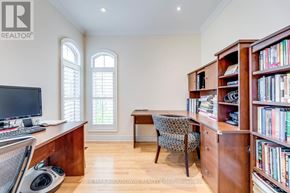 Oakville (Jc Joshua Creek) apartment for rent - A room with a desk, chair, and bookshelf.