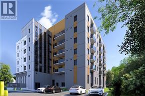 Waterloo condo for rent - A modern apartment building with cars parked in front.