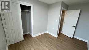 Welland apartment for rent - A room with a white door and a white wall.