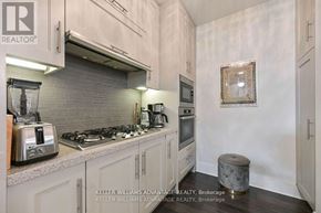 Toronto (Waterfront Communities) house for rent - A kitchen with a toaster on the counter.