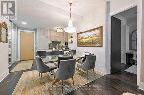 Toronto (Waterfront Communities) house for rent - A dining room with a glass table and grey chairs.