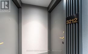 Vaughan (Vaughan Corporate Centre) condo for rent - A door with a number 3212 on it is in a room with a light on.