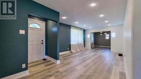 Toronto (Willowdale West) apartment for rent - A room with a white door and a window with white curtains.