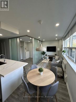 Toronto (Annex) multi-family for rent - A modern kitchen with a dining table and chairs.