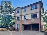 Brampton (Brampton West) apartment for rent - A two-story house with a garage on the ground floor.