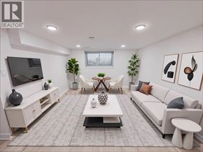 Kitchener apartment for rent - A living room with a grey carpet and white furniture.