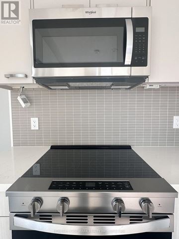 Toronto (Mount Pleasant West) condo for rent - A stainless steel oven with a microwave above it in a kitchen.