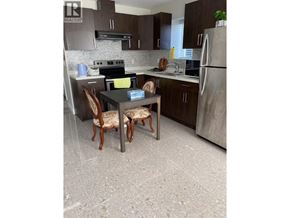 Vancouver apartment for rent - A kitchen with a table and chairs.