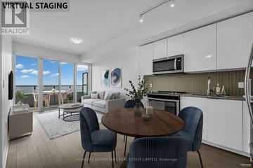 Toronto (Mimico) condo for rent - A modern kitchen with a dining table and chairs.