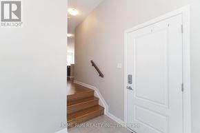 Ottawa townhouse for rent - A white door is on the right side of the image.