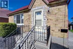 Kitchener apartment for rent - A house with the number 320 on it.