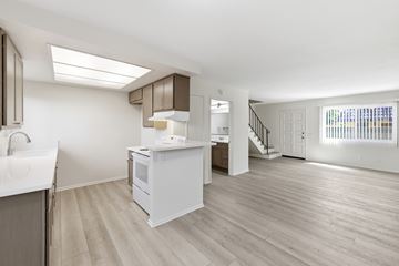 Garden Grove apartment for rent - A kitchen with a sink, stove, and refrigerator.
