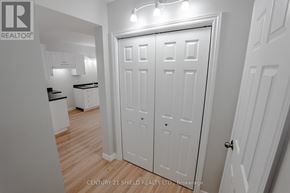 North Stormont fourplex for rent - A white door in a room with wooden floors and white walls.
