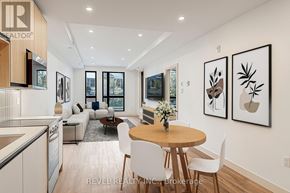 Lincoln (Beamsville) condo for rent - A modern dining room with a round table and chairs.