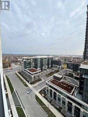 Markham (Unionville) condo for rent - A real estate company logo is displayed on a building.
