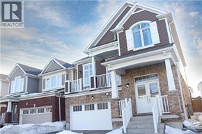 Kitchener apartment for rent - A large house with a garage is for sale.