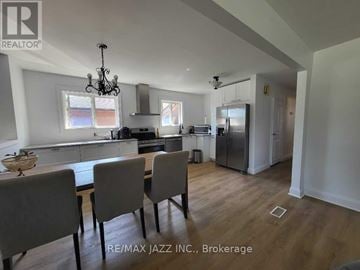 Oshawa (Donevan) apartment for rent - A dining room with a table set for four.