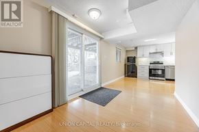 Markham (Aileen-Willowbrook) apartment for rent - A spacious kitchen with wooden floors and white walls.