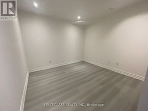 Markham (Markville) apartment for rent - A room with a grey floor and white walls.