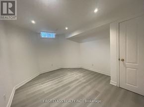 Markham (Markville) apartment for rent - A room with a wooden floor and white walls.