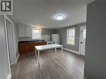 Cambridge apartment for rent - A kitchen with a table and a refrigerator.