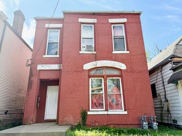 Louisville apartment for rent - A red brick building with the number 2720 on the front.