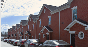Orangeburg apartment for rent - A row of houses with cars parked in front.