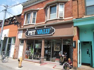 Toronto apartment for rent - A pet store with a blue sign on the front.