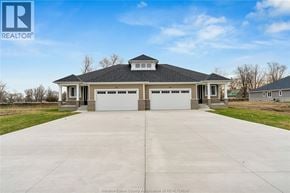 Amherstburg apartment for rent - A house with a large driveway in front of it.