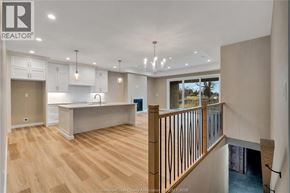 Amherstburg apartment for rent - A spacious open floor plan with a kitchen and a dining area.
