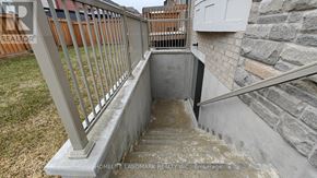Vaughan (Vellore Village) apartment for rent - A concrete staircase with a metal railing.