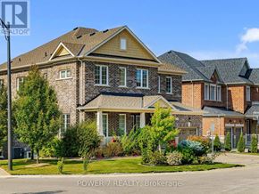 Aurora (Aurora Estates) apartment for rent - A house with a well-maintained lawn in front of it.