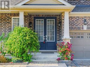 Aurora (Aurora Estates) apartment for rent - A house with a dark blue front door and a window with white trim.