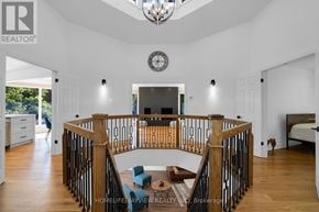 Oro-Medonte (Horseshoe Valley) apartment for rent - A large open living room with a staircase and a chandelier.