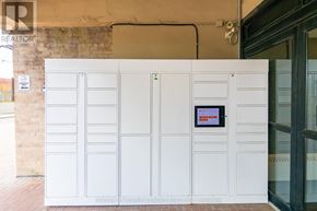 Toronto (Humbermede) condo for rent - A white board with a red screen is mounted on a wall.