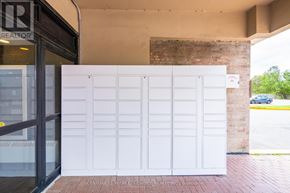 Toronto (Humbermede) condo for rent - A white garage door is closed.