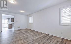 Shelburne apartment for rent - A spacious room with wooden flooring and a window on the right side.