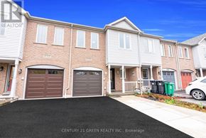 Mississauga (Churchill Meadows) townhouse for rent - A real estate photo of a house with the text "CENTURY 21 GREEN REALTY INC., Brokerage" on it.