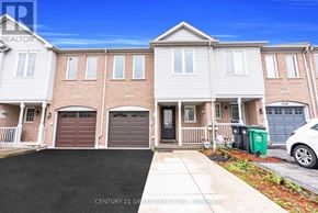 Mississauga (Churchill Meadows) townhouse for rent - A real estate photo of a residential building with the text "CENTURY 21 GREENWOOD".
