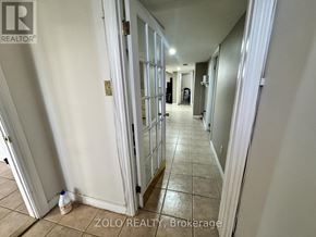 Hamilton (Jerome) apartment for rent - A hallway with a white door and a white wall.