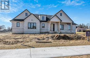 Norwich (Otterville) apartment for rent - A house under construction with a sign in front that says "For Sale".