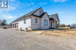 Norwich (Otterville) apartment for rent - A house under construction with a clear sky above.