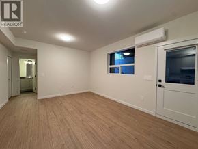 Maple Ridge apartment for rent - A room with a window and a door is available for rent.