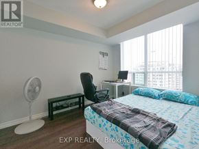 Toronto (Bayview Village) condo for rent - A bedroom with a bed, desk, and chair.