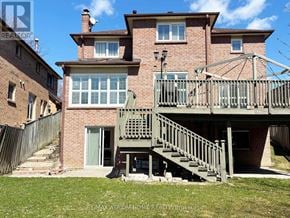 Markham (Thornlea) apartment for rent - A house with a balcony and stairs leading to the entrance.